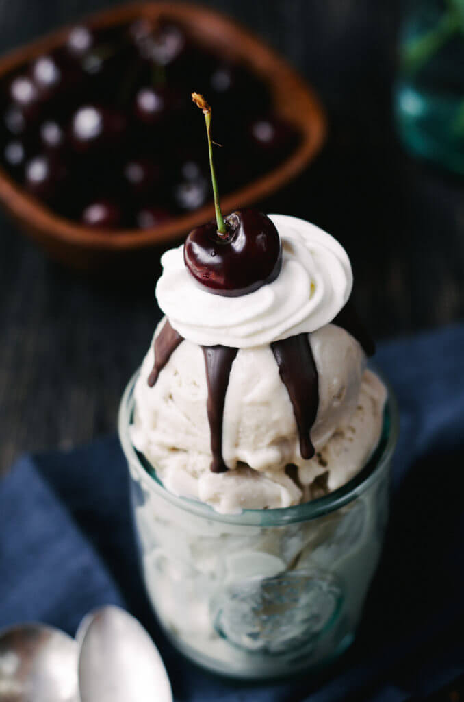 Nothing says summer like this rich and creamy Banana Split. This smooth and decadent frozen dessert is dairy free, paleo, and has a vegan option as well.