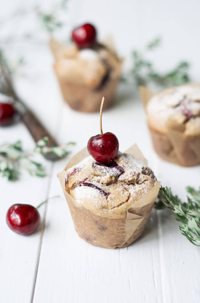 These easy breakfast muffins are soft, moist, cakey and paleo! Stuffed with fresh cherries and delicious served with fresh whipped cream. These easy to make grain free breakfast treats are an easy and healthy go-to recipe.
