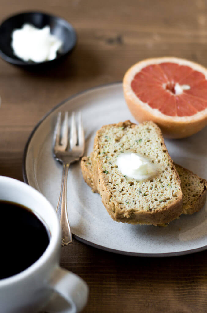 This 5 Minute Paleo Zucchini Bread is incredibly moist, light, and fluffy. Packed with protein and whole foods, this easy to make bread is a tasty treat for breakfast and any snacking occasion.