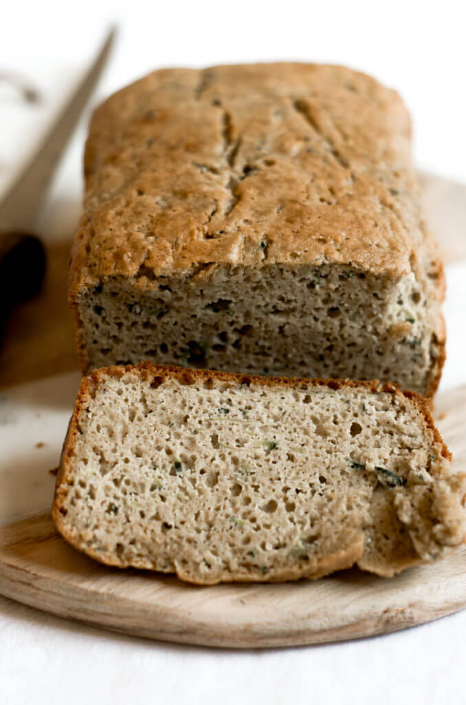 This 5 Minute Paleo Zucchini Bread is incredibly moist, light, and fluffy. Packed with protein and whole foods, this easy to make bread is a tasty treat for breakfast and any snacking occasion.
