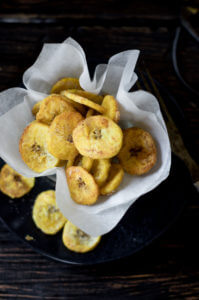 These crispy plantain chips are lightly dazzled with sea salt. Paleo and gluten free, these 10 minute plantain chips are made with only 3 ingredients! Make them sweet or savory. A perfect healthy snack!