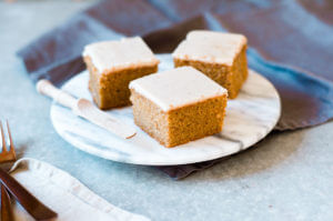 Grain free, gluten free, healthy, paleo, protein packed pumpkin cake with vegan maple frosting- no refined sugar! Soft, light, perfect for a fall dessert or healthy paleo snack. Easy Pumpkin Breakfast Cake.