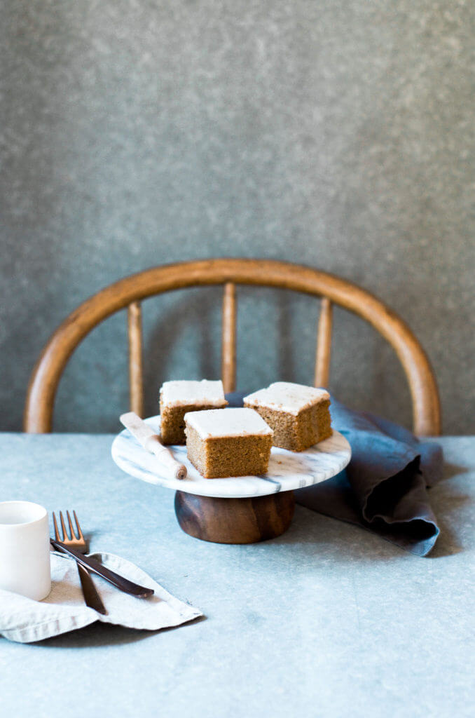 Grain free, gluten free, healthy, paleo, protein packed pumpkin cake with vegan maple frosting- no refined sugar! Soft, light, perfect for a fall dessert or healthy paleo snack. Easy Pumpkin Breakfast Cake. Food photogrpahy