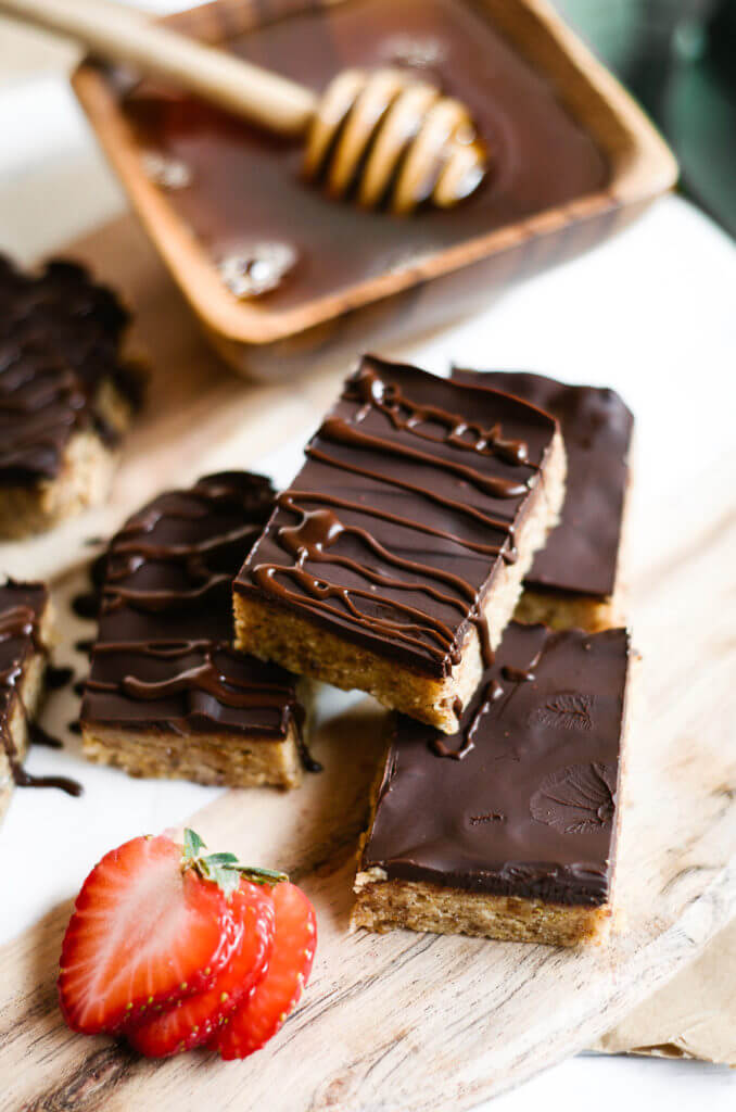 Best Paleo “Peanut Butter” Protein Bars. Gluten free, paleo, and healthy snacks and dessert recipes for on the go. Easy paleo cookies.