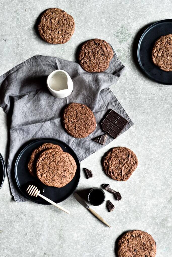 Gluten free, grain free, healthy, paleo pumpkin chocolate chip cookies. Easy to make soft and chewy paleo almond butter cookies- with a crisp cookie crust. Healthy snack for on the go or tasty dessert.