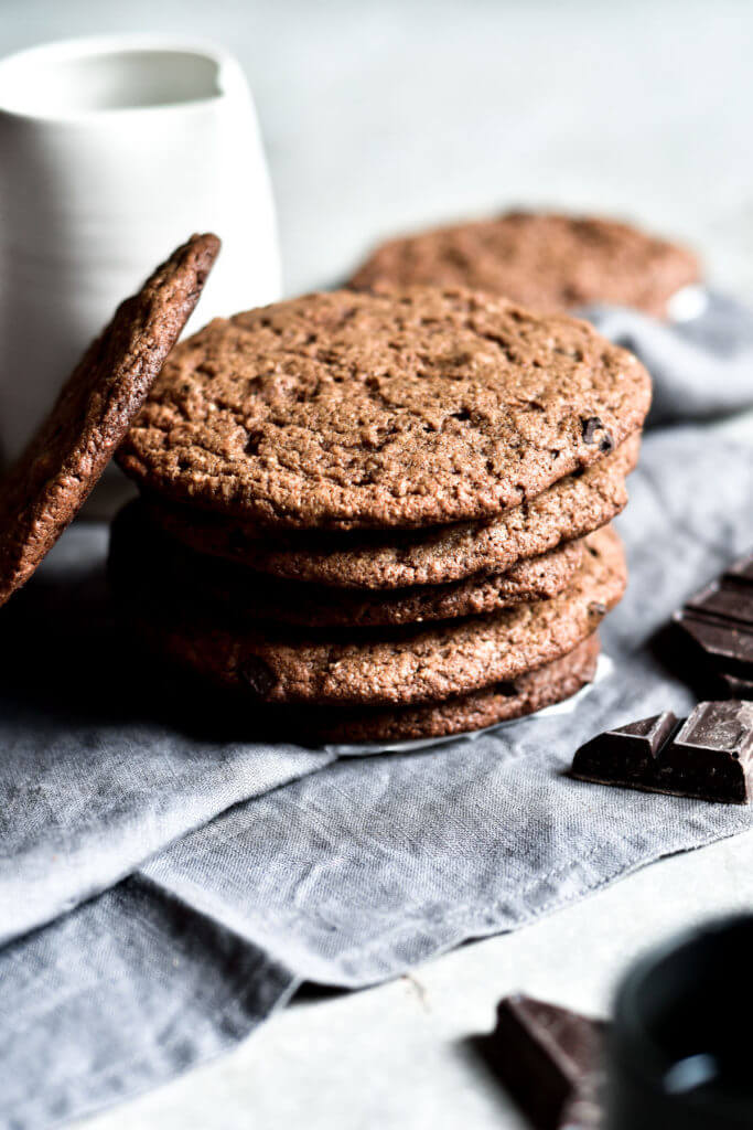 Gluten free, grain free, healthy, paleo pumpkin chocolate chip cookies. Easy to make soft and chewy paleo almond butter cookies- with a crisp cookie crust. Healthy snack for on the go or tasty dessert.