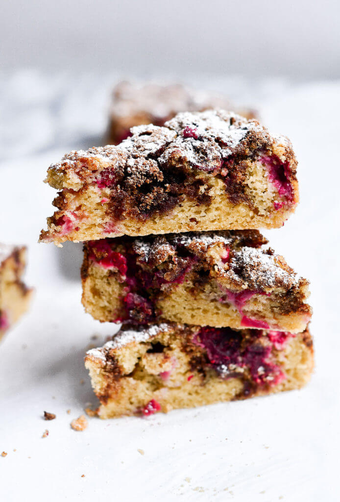 Drool worthy Healthy gluten free cranberry coffee cake. Wow your guest or make Christmas morning a stunner with this 10 minute paleo coffee cake. Healthy breakfast idea.