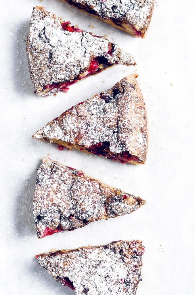 Drool worthy Healthy gluten free cranberry coffee cake. Wow your guest or make Christmas morning a stunner with this 10 minute paleo coffee cake. Healthy breakfast idea.