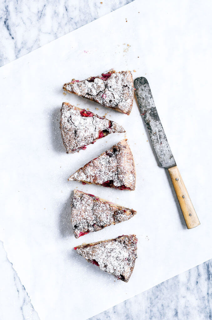 Drool worthy Healthy gluten free cranberry coffee cake. Wow your guest or make Christmas morning a stunner with this 10 minute paleo coffee cake. Healthy breakfast idea.