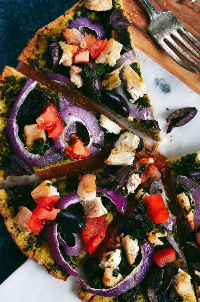 Best and easiest 20 minute no rise paleo pizza! Topped with chicken breast, olives, pesto. Best easy gluten free pizza crust. Best paleo pizza crust. Easy paleo pizza crust. Paleo pizzas. Best gluten free chicken pizza. Top healthy pizza.