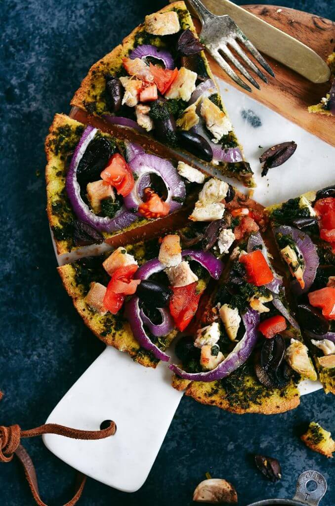 Best and easiest 20 minute no rise paleo pizza! Topped with chicken breast, olives, pesto. Best easy gluten free pizza crust. Best paleo pizza crust. Easy paleo pizza crust. Paleo pizzas. Best gluten free chicken pizza. Top healthy pizza.