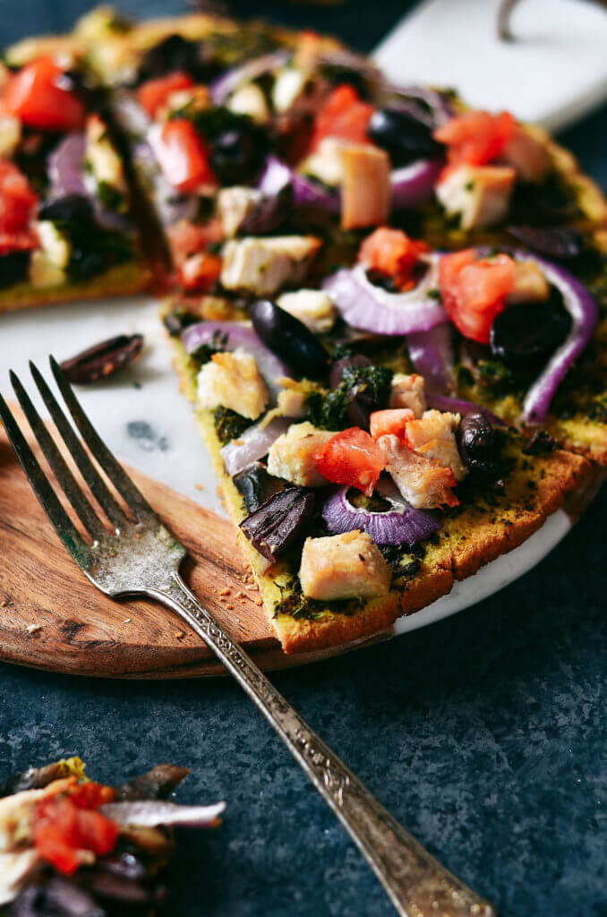 Best and easiest 20 minute no rise paleo pizza! Topped with chicken breast, olives, pesto. Best easy gluten free pizza crust. Best paleo pizza crust. Easy paleo pizza crust. Paleo pizzas. Best gluten free chicken pizza. Top healthy pizza.
