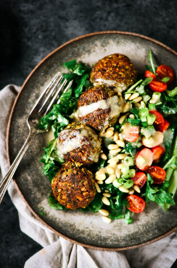 These warm flavorful falafels are better than the real deal! Packed with cauliflower and fresh herbs! A low carb delicious whole30 meal that is easily made in a blender. Easy baked falafel recipe. Best paleo falafel recipes. Falafel sauce. Healthy falafel. Easy whole30 cauliflower falafel. Made in 15 minutes! Paleo, healthy, and easy to make! Easy whole30 dinner recipes. Whole30 recipes. Whole30 lunch. Whole30 recipes just for you. Whole30 meal planning. Whole30 meal prep. Healthy paleo meals. Healthy Whole30 recipes. Easy Whole30 recipes