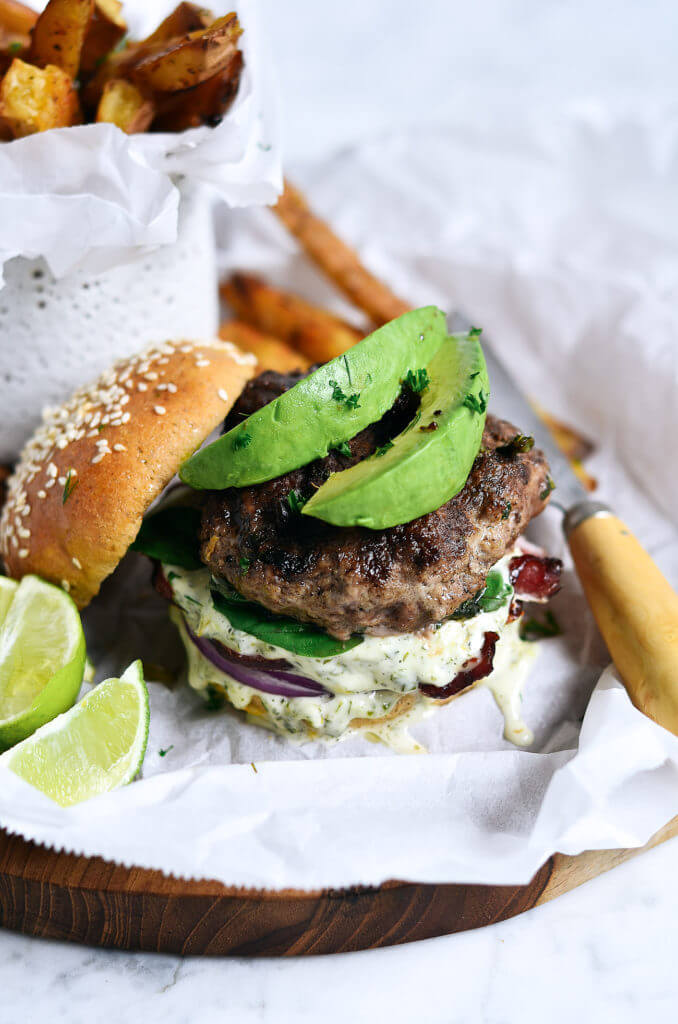 The most delicious LEGIT Paleo bacon avocado burgers! Loaded with fresh basil and garlic. Topped with a creamy white sauce and red onion. Plus, these fluffy and soft grain free buns are to die for! Check out the whole30 burger option too! Paleo burger recipe. Paleo burger patties. Paleo beef burgers. Paleo meal plan. Easy paleo dinner recipes. Easy whole30 dinner recipes. Whole30 recipes. Whole30 lunch. Whole30 meal planning. Whole30 meal prep. Healthy paleo meals. Healthy Whole30 recipes. Easy Whole30 recipes.