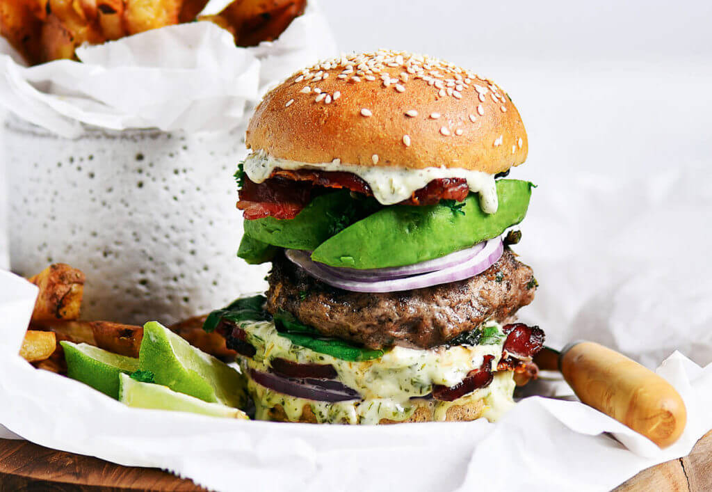LEGIT Paleo bacon avocado burgers! Loaded with fresh basil and garlic. Topped with a creamy white sauce and red onion. Plus, these fluffy and soft grain free buns are to die for! Check out the whole30 burger option too! Paleo burger recipe. Paleo burger patties. Paleo beef burgers. Paleo meal plan. Easy paleo dinner recipes. Easy whole30 dinner recipes. Whole30 recipes. Whole30 lunch. Whole30 meal planning. Whole30 meal prep. Healthy paleo meals. Healthy Whole30 recipes. Easy Whole30 recipes.