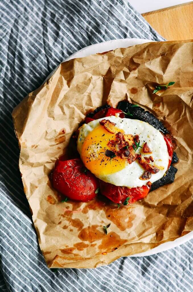 Beautiful egg toast with gorgeous roasted tomatoes and pan roasted portobello mushrooms. Topped off with GARLIC CRISPIES!!, fresh thyme, sea salt, and fresh cracked pepper. A quick, easy, whole30, and paleo breakfast! whole30 breakfast. easy whole30 breakfast ideas. whole30 meal plan. Easy whole30 dinner recipes. Easy whole30 dinner recipes. Whole30 recipes. Whole30 lunch. Whole30 meal planning. Whole30 meal prep. Healthy paleo meals. Healthy Whole30 recipes. Easy Whole30 recipes. Easy whole30 dinner recipes. Best avocado recipes. Dairy free pesto recipe. whole30 apple recipe.