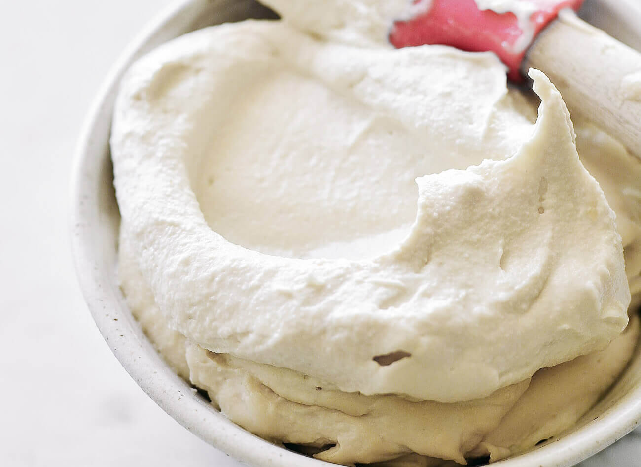 Easy dairy free, vegan, and paleo cream cheese recipe. Soy free, made in 5 minutes, and able to store in the fridge for 1 week. Addictively creamy and a perfect addition to any recipe- savory or sweet! Paleo cream cheese recipe. Easy paleo cheese recipe. Dairy free cheese recipe. Cashew cream cheese recipe. Best cashew cheese recipe. Easy vegan cheese recipe. Best dairy free cheese ideas. Dairy free cream cheese. Best paleo raw dairy free cheese. raw cheese recipes. cashew cheese recipes.