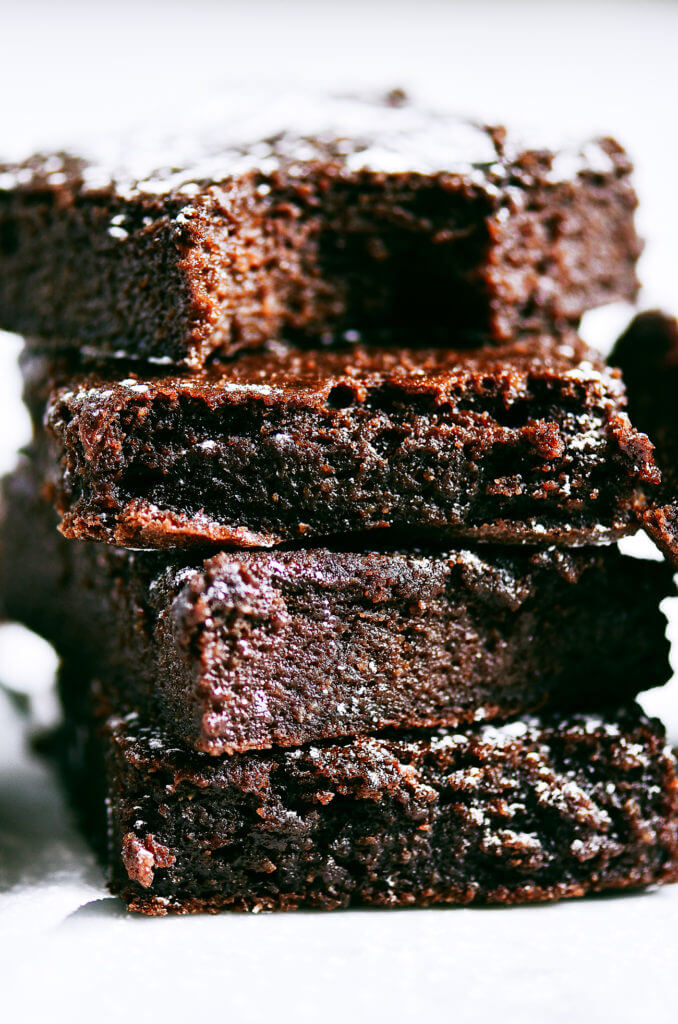 Fudgey paleo applesauce brownies made with collagen! Easy decadent and healthy treat. Cakey and moist! Gluten free, dairy free, and naturally sweetened. Make ahead and freeze! Best gluten free brownies. Best paleo brownies recipe. Fudgey paleo brownie recipe. Fudgey chocolate brownies. Healthy brownie recipe. Easy paleo brownies.