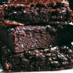 Best gluten free brownies. Best paleo brownies recipe. Fudgey paleo brownie recipe. Fudgey chocolate brownies. Healthy brownie recipe. Easy paleo brownies. Fudgey paleo applesauce brownies made with collagen! Easy decadent and healthy treat. Cakey and moist! Gluten free, dairy free, and naturally sweetened. Make ahead and freeze!