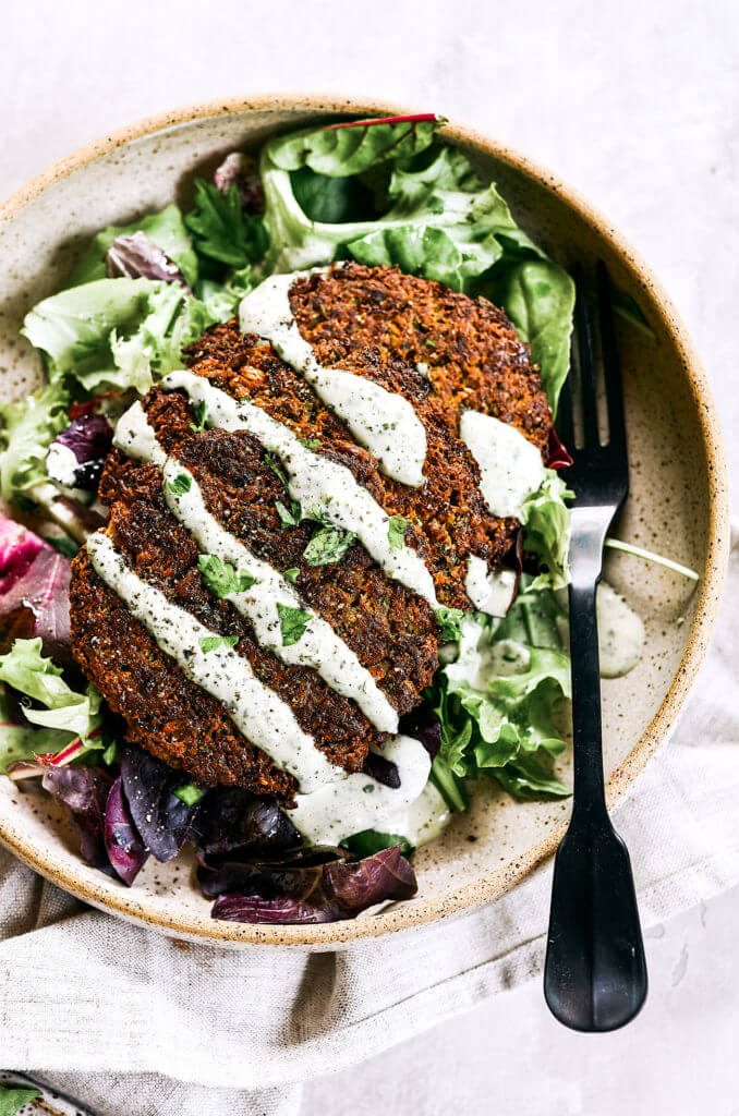 Crispy baked whole30 cauliflower patties with a delicious creamy cilantro garlic sauce. Easy paleo and whole30 recipe for lunch, dinner, and even breakfast if you’re like me! whole30 meal plan. Easy whole30 dinner recipes. Easy whole30 dinner recipes. Whole30 recipes. Whole30 lunch. Whole30 meal planning. Whole30 meal prep. Healthy paleo meals. Healthy Whole30 recipes. Easy Whole30 recipes. Easy whole30 dinner recipes. Healthy breakfast recipes. Cauliflower pancake recipe. Easy cauliflower whole30 recipes. Paleo pancake recipe. Easy paleo dinner recipes.