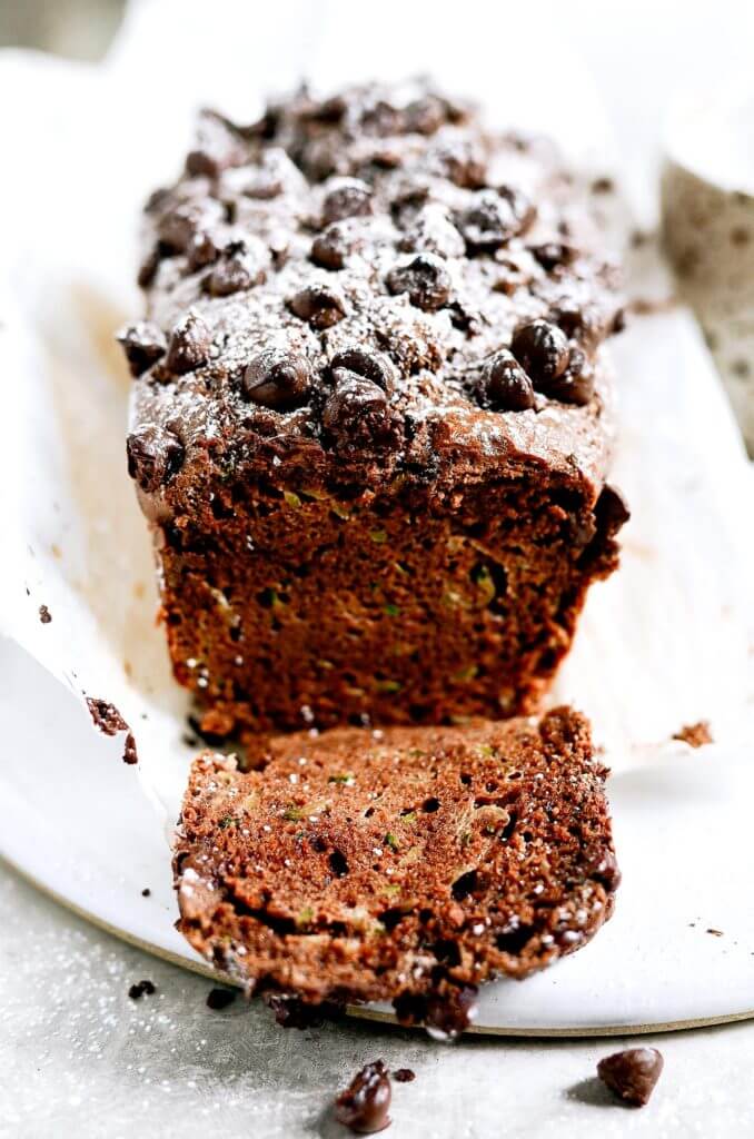 This paleo chocolate zucchini bread is soft, light, and moist, plus gluten free! It’s ready for baking in 5 minutes! Easy to whip up in the food processor. Freezer friendly and a crowd pleaser! Easy paleo diet recipes. Best gluten free bread. Easy paleo bread recipe. Best paleo zucchini bread recipe. Easy gluten free zucchini bread. Best gluten free zucchini bread.