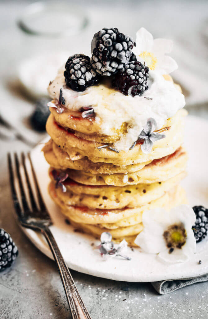 Easy healthy pancake recipe the whole family will love! Paleo pancakes that can be made ahead and stored in the freezer for quick and easy paleo breakfasts on the go. Recipe for light and fluffy homestyle grain free pancakes.