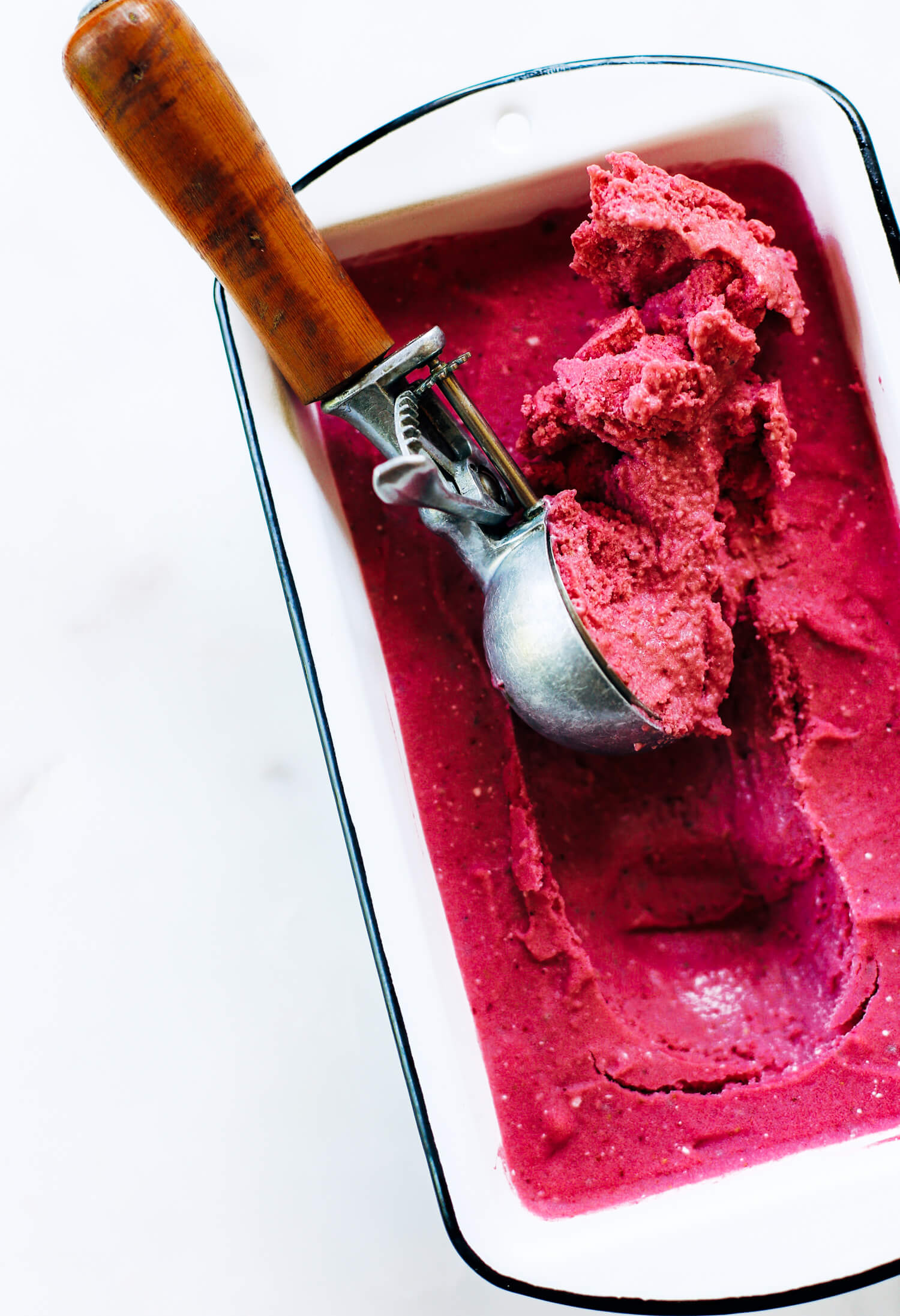 Three minute strawberry ice-cream. 43 calories per scoop! No bananas! Made instantly in a blender. No churn, no machine, no freezing. No waiting! Vegan and paleo. It’s practically lunch!
