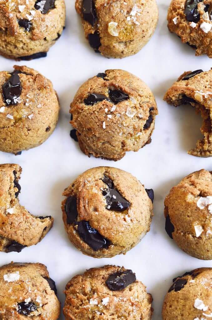 Thick and chewy paleo vegan chocolate chunk cooke recipe. The most delicious paleo and vegan chocolate chunk cookies! Thick, of so soft, chewy, perfect texture. Ready for eating in only 15 minutes. My favorite Paleo cookie I’ve ever made… and I’ve made a lot! Easy paleo cookies. Paleo cookies recipe. Healthy paleo cookies. Paleo chocolate chip cookie recipe. Almond flour cookie recipe. Easy healthy cookie recipe. Best gluten free chocolate chip cookie recipe. vegan cookie recipes. Easy vegan cookies. Easy gluten free cookies. Best paleo chocolate chip cookies. Simple paleo chocolate chip cookies. Maple syrup paleo cookie recipe.
