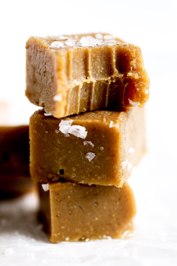 3 ingredient paleo salted caramel cashew butter fudge. Healthy, easy, and has a great “pull apart” (like caramel!)! Store in the freezer for best results and fresh keeping. Silly smooth, paleo, vegan, and easy to make! Paleo fudge. Best paleo fudge recipe. Best dairy free fudge recipe. Easy fudge recipe Easy chocolate fudge. Paleo dessert ideas. Best paleo snacks. Best paleo desserts. Vegan fudge recipe. Easy vegan fudge recipes. Dairy free dessert ideas.Best cashew butter fudge recipe.