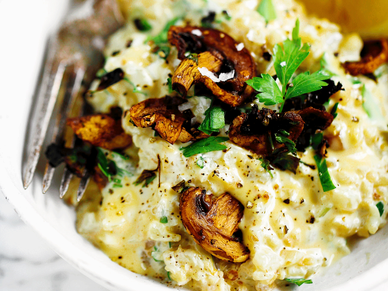 This recipe for whole30 “cheesy” risotto will leave you wanting more! Healthy whole30 and paleo creamy cauliflower risotto with truffle toasted mushrooms and a silky smooth best ever vegan cheese sauce! Only three minutes cooking time! whole30 meal plan. Easy whole30 dinner recipes. Easy whole30 dinner recipes. Whole30 recipes. Whole30 lunch. Whole30 meal planning. Whole30 meal prep. Healthy paleo meals. Healthy Whole30 recipes. Easy Whole30 recipes. Easy whole30 dinner recipes. Best whole30 dinner recipes. Best cauliflower fried rice recipe. Easy cauliflower rice. Best cauliflower rice. Healthy paleo dinner recipe. Easy paleo meal ideas.