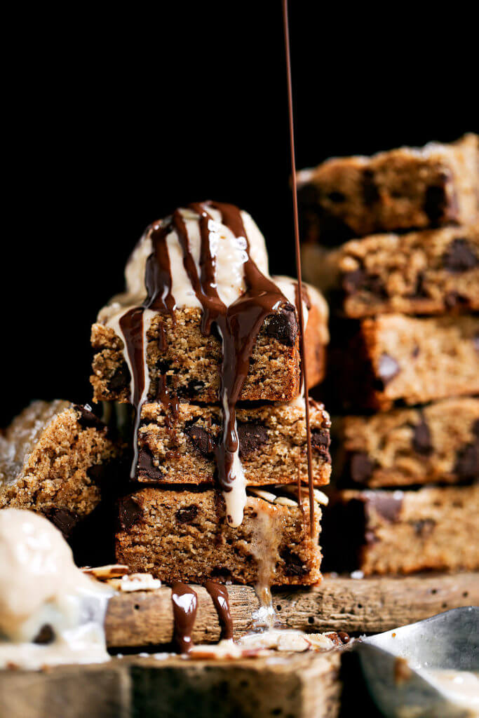 The best soft and chewy paleo blondies! Gluten free, low in sugar (1/4 cup coconut sugar in the whole batch!), and vegan. This recipe can be made ahead and stored in the freezer. It’s also safe for raw cookie dough eating. Yum! Easy paleo baking. Maple syrup blondies. Vegan blondie recipe. low carb paleo blondies. almond butter paleo blondies. Healthy vegan blondies recipes. Gluten free vegan blondies. Easy vegan blondies. Paleo cookie bar. Easy paleo cookies.