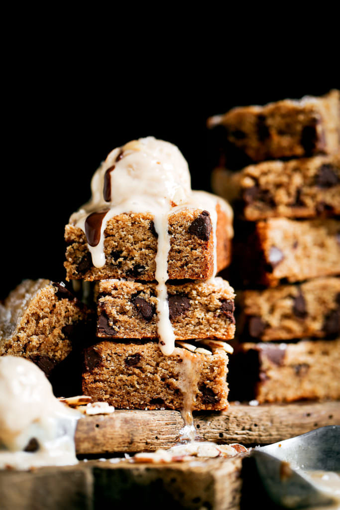 The best soft and chewy paleo blondies! Gluten free, low in sugar (1/4 cup coconut sugar in the whole batch!), and vegan. This recipe can be made ahead and stored in the freezer. It’s also safe for raw cookie dough eating. Yum! Easy paleo baking. Maple syrup blondies. Vegan blondie recipe. low carb paleo blondies. almond butter paleo blondies. Healthy vegan blondies recipes. Gluten free vegan blondies. Easy vegan blondies. Paleo cookie bar. Easy paleo cookies.