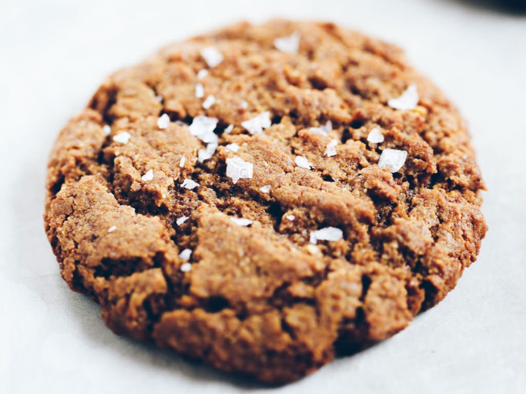 Meet your new cookie obsession! Coconut sweetened paleo almond butter cookies. Soft, chewy, and gooey on the inside, and crisp with a little crunch on the outside. Naturally gluten free, flourless, and vegan. Grain free, flourless, and dairy free. Easy flourless cookies. Gluten Free cookie recipe. Healthy peanut butter gluten free cookies. Flourless cookie recipe. Easy healthy cookie recipe. Best gluten free cookie recipe. vegan cookie recipes. Easy vegan cookies. Easy gluten free cookies. Coconut sugar cookies. Coconut sugar cookie recipe.