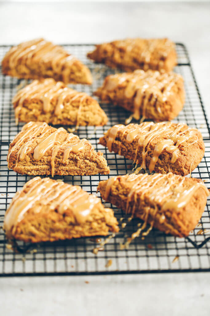 Easy gluten free, paleo pumpkin spice scones with maple glaze. A warm and comforting grain free treat for cosy fall mornings. This grain free pumpkin scone recipe is a family favorite. If you love scones as much as I do, then today is gonna be a good day for you! Easy gluten free scones Gluten free pumpkin scones. Paleo pumpkin scones. Paleo vegan pumpkin scones. Easy paleo pumpkin scones. Starbucks copy cat pumpkin scones. Healthy gluten free scones.