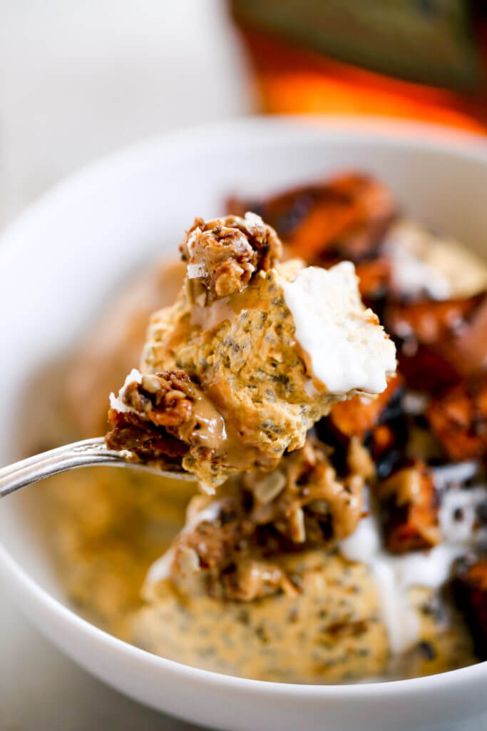 I’m OBSESSED with this thick, creamy, coconut yogurt pumpkin chia breakfast! What an easy paleo breakfast idea! A bowl full of creamy pumpkin spice pudding, topped with roasted sweet potatoes and nut butter! Ready in just 3 minutes, free of added sugar, Paleo, dairy free, and gluten free. Just as delicious for a snack as it is for breakfast!