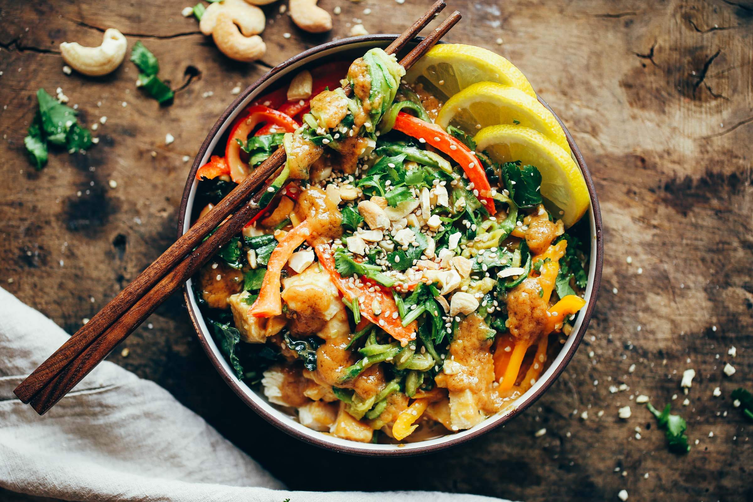 15 Minute whole30 Thai chicken noodles with “peanut” sauce, kale, and bell peppers. An easy family friendly meal, serve hot or cold! Easy whole30 dinner recipes. Whole30 recipes. Whole30 lunch. Whole30 recipes just for you. Whole30 meal planning. Whole30 meal prep. Healthy paleo meals. Healthy Whole30 recipes. Easy Whole30 recipes. Zucchini Noodle recipes.