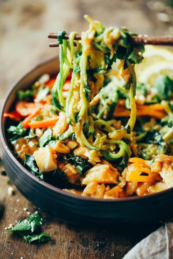 15 Minute whole30 Thai chicken noodles with “peanut” sauce, kale, and bell peppers. An easy family friendly meal, serve hot or cold! Easy whole30 dinner recipes. Whole30 recipes. Whole30 lunch. Whole30 recipes just for you. Whole30 meal planning. Whole30 meal prep. Healthy paleo meals. Healthy Whole30 recipes. Easy Whole30 recipes. Zucchini Noodle recipes.