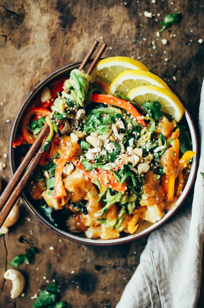 15 Minute whole30 Thai chicken noodles with “peanut” sauce, kale, and bell peppers. An easy family friendly meal, serve hot or cold! Easy whole30 dinner recipes. Whole30 recipes. Whole30 lunch. Whole30 recipes just for you. Whole30 meal planning. Whole30 meal prep. Healthy paleo meals. Healthy Whole30 recipes. Easy Whole30 recipes. Zucchini Noodle recipes.