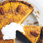The easiest vegan pumpkin cheesecake! Grain free and paleo friendly. Pecan cookie crunch crust with a creamy vegan pumpkin filling. Lightly sweetened with maple syrup. Vegan, gluten free, and dairy free! Incredibly creamy and satisfying! Raw paleo cheesecake recipe. No bake cashew cheesecake. Best gluten free vegan cheesecake. Raw paleo cheesecake recipe. No bake cheesecake recipe. Paleo cream cheese. Best paleo dessert recipes. easy cashew cheesecake.