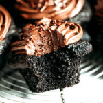Paleo chocolate cupcakes-moist, but not eggy! These paleo cupcakes have a rich, dark chocolate taste and are covered in a whipped dairy free refined sugar free chocolate frosting! Coconut flour cupcakes. Best easy Paleo cupcakes. Paleo cupcakes recipes. Gluten free chocolate cupcakes. Gluten free coconut flour cupcakes. Dairy free healthy cupcakes. Paleo chocolate frosting.