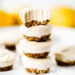 No-bake lemon cheesecake bites made in the blender! (Paleo + vegan). Thick creamy cashew cheesecake lemon layer with nut and date crust. Bite-size made quickly in a blender or food processor- chilled before eating! Gluten free, dairy free, refined sugar free. Easy no bake cheesecake recipes. NO Bake cheesecake Filling. Easy vegan cheesecake recipes. Best vegan cheesecake. Easy paleo cheesecake recipes. Dairy free paleo cheesecake. Best raw cheesecake recipes. Easy raw cheesecake.