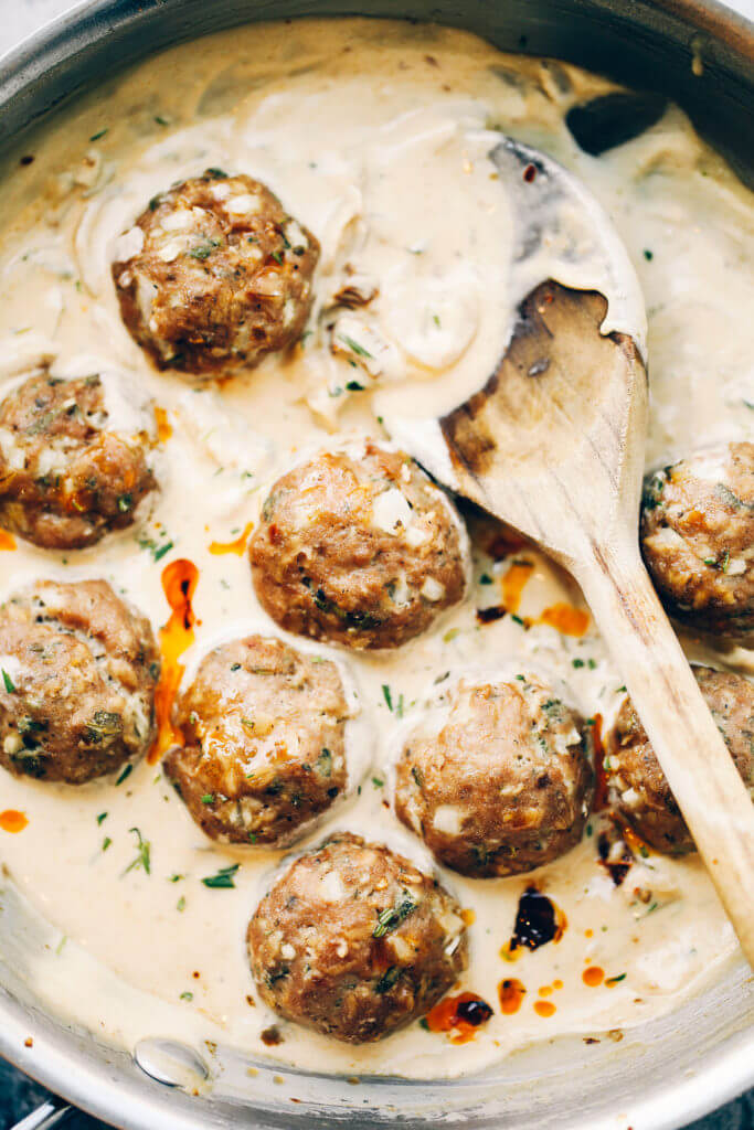 Unbelievably easy Oven Baked Paleo TURKEY MEATBALLS AND SAGE CREAM SAUCE (Gluten free, whole30, paleo). Perfect for a weeknight dinner or breakfast! On the table in LESS than 25 minutes! Paleo turkey meatballs. Whole30 breakfast recipes. Easy whole30 breakfast ideas. Whole30 families meatballs. Ground turkey whole30 meatballs. Easy whole30 recipes. Whole30 meal planning. Easy whole30 dinner recipes. Whole30 shopping list.