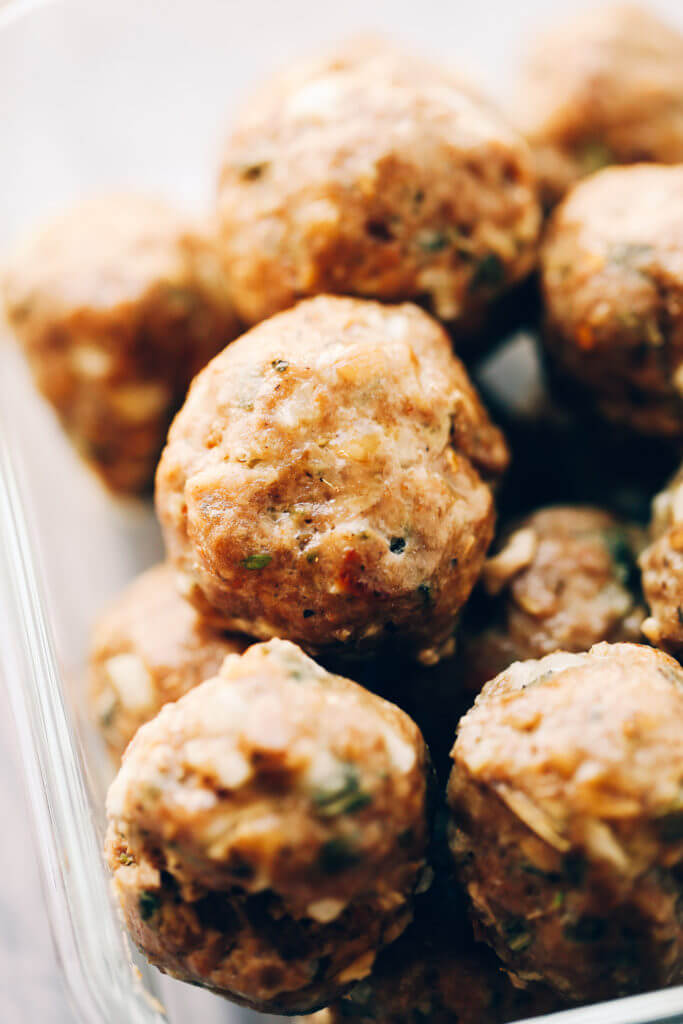 Unbelievably easy Oven Baked Paleo TURKEY MEATBALLS AND SAGE CREAM SAUCE (Gluten free, whole30, paleo). Perfect for a weeknight dinner or breakfast! On the table in LESS than 25 minutes! Paleo turkey meatballs. Whole30 breakfast recipes. Easy whole30 breakfast ideas. Whole30 families meatballs. Ground turkey whole30 meatballs. Easy whole30 recipes. Whole30 meal planning. Easy whole30 dinner recipes. Whole30 shopping list.