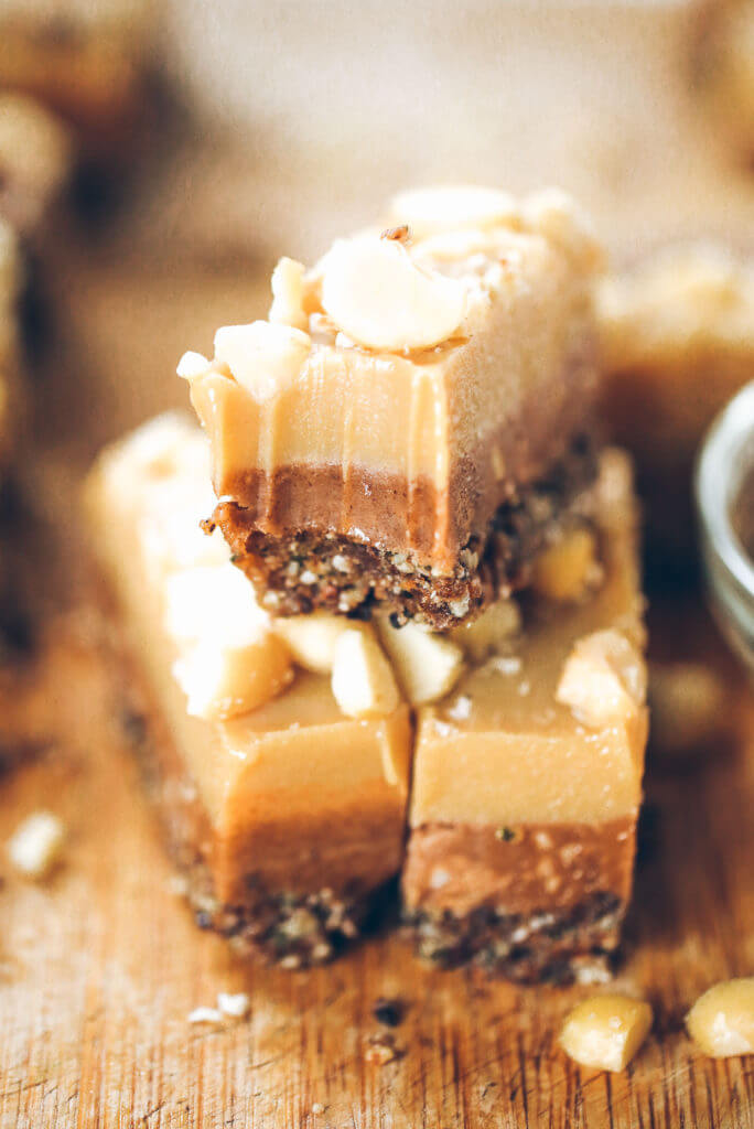 Three layers of coconut oil caramel fudge- refined sugar free, raw, paleo. Layered with tahini + almond butter fudge! Paleo candy recipes. Paleo candy bar. SO easy to make! Tastes like Christmas candy, but it’s sugar free, paleo, and raw! Paleo candy pecans. Low carb candy. Healthy candy recipes. Paleo caramel. Easy healthy paleo caramel. Paleo fudge. Easy almond butter fudge. Tahini fudge. Healthy dairy free fudge recipes. Coconut oil fudge.
