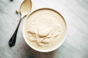 Creamy 5 minute vegan cashew cheese sauce! Whole30, paleo, and dairy free. Whipped smooth, made with raw cashews, and tastes like the perfect cheese dip for vegetables, chips, served over noodles, or licked straight off the spoon! Dairy free cheese. Dairy free Alfredo. Easy Cashew cheese. Homemade cashew cheese. easy vegan paleo cheese recipe. Best Dairy free cashew cheese recipe.