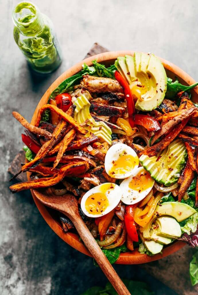 Grilled Garlic Lime Chicken Fajita Salad loaded with crispy sweet potato fries, grilled chicken, and topped with creamy avocado dressing made in the blender! Paleo, whole30, and makes for easy meal prep! Whole30 meal plan that's quick and healthy! Whole30 recipes just for you. Whole30 meal planning. Whole30 meal prep. Healthy paleo meals. Healthy Whole30 recipes. Easy Whole30 recipes. Best paleo dinner recipes.