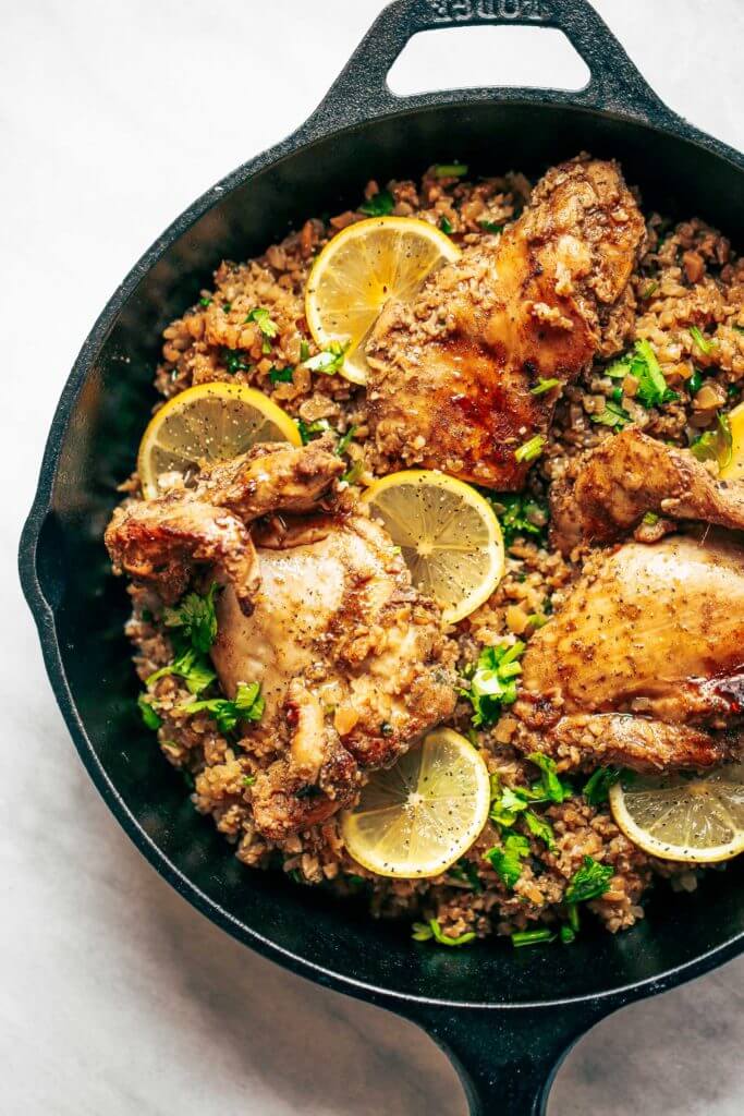One pan Spanish cauliflower rice made in 25 minutes! Bursting with flavor! Paleo and whole30 friendly. Made with lemon, cilantro, chicken, and cauliflower rice. This one-pan skillet recipe makes for fast and easy meal prep that tastes delicious! whole30 meal plan. Easy whole30 dinner recipes. Easy whole30 dinner recipes. Whole30 recipes. Whole30 lunch. Whole30 meal planning. Whole30 meal prep. Healthy paleo meals. Healthy Whole30 recipes. Easy Whole30 recipes. Easy whole30 dinner recipes.
