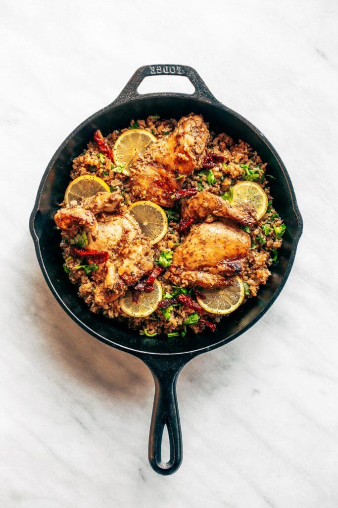 One pan Spanish cauliflower rice made in 25 minutes! Bursting with flavor! Paleo and whole30 friendly. Made with lemon, cilantro, chicken, and cauliflower rice. This one-pan skillet recipe makes for fast and easy meal prep that tastes delicious! whole30 meal plan. Easy whole30 dinner recipes. Easy whole30 dinner recipes. Whole30 recipes. Whole30 lunch. Whole30 meal planning. Whole30 meal prep. Healthy paleo meals. Healthy Whole30 recipes. Easy Whole30 recipes. Easy whole30 dinner recipes.