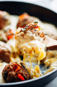 Best healthy paleo and whole30 creamy spaghetti squash noodles with italian meatballs and alfredo sauce! A delicious healthy paleo, dairy free, and whole30 recipe that can be made a head and frozen. Easy whole30 dinner recipes. Easy whole30 dinner recipes. Whole30 recipes. Whole30 lunch. Whole30 meal planning. Whole30 meal prep. Healthy paleo meals. Healthy Whole30 recipes. Easy Whole30 recipes. Easy whole30 dinner recipes.