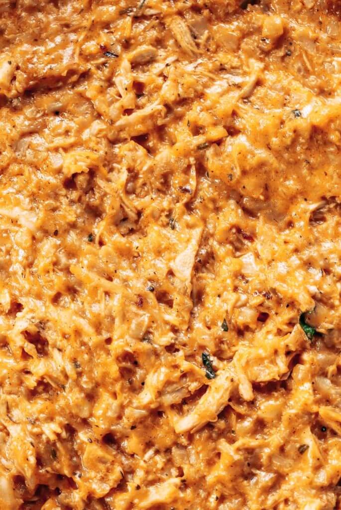 Creamy dairy free buffalo chicken and cauliflower rice bake. Perfect for dipping veggies, chips, or loading on a baked potato! This “cheesy” creamy dip makes the perfect lunch when paired with a handful of carrot sticks! Paleo, whole30, and gluten free.Whole30 meal plan that's quick and healthy! Whole30 recipes just for you. Whole30 meal planning. Whole30 meal prep. Healthy paleo meals. Healthy Whole30 recipes. Easy Whole30 recipes. Best paleo dinner recipes.